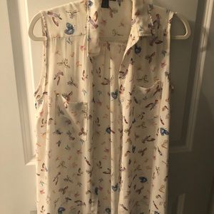 Sleeveless button up blouse with birds
